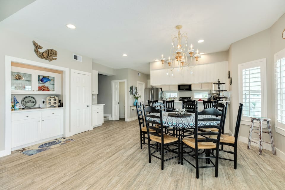 Easily serve meals from the adjacent kitchen