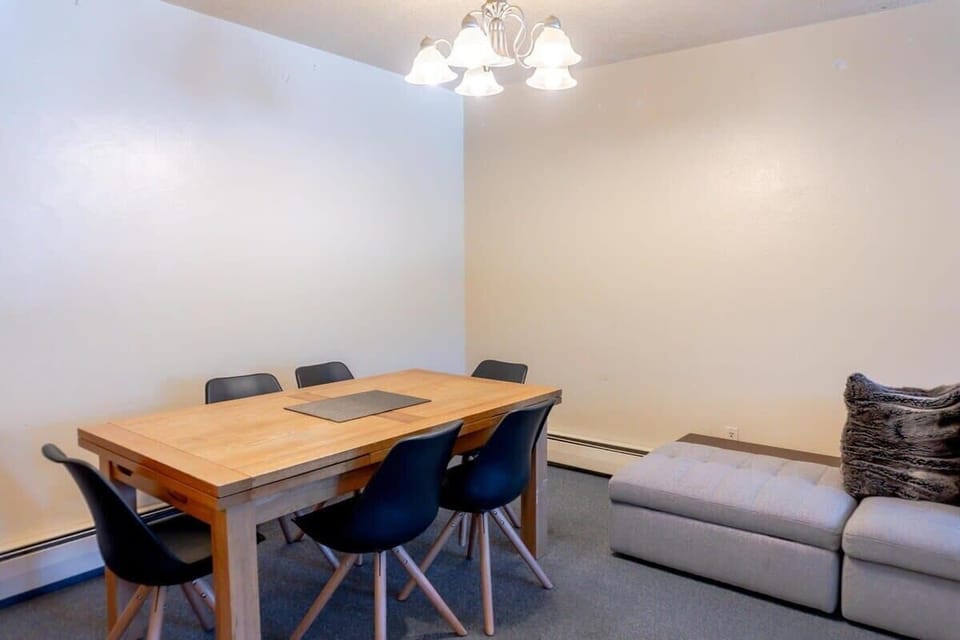 Enjoy a meal or game night at the dining table with seating for 6 located just off the living room area.