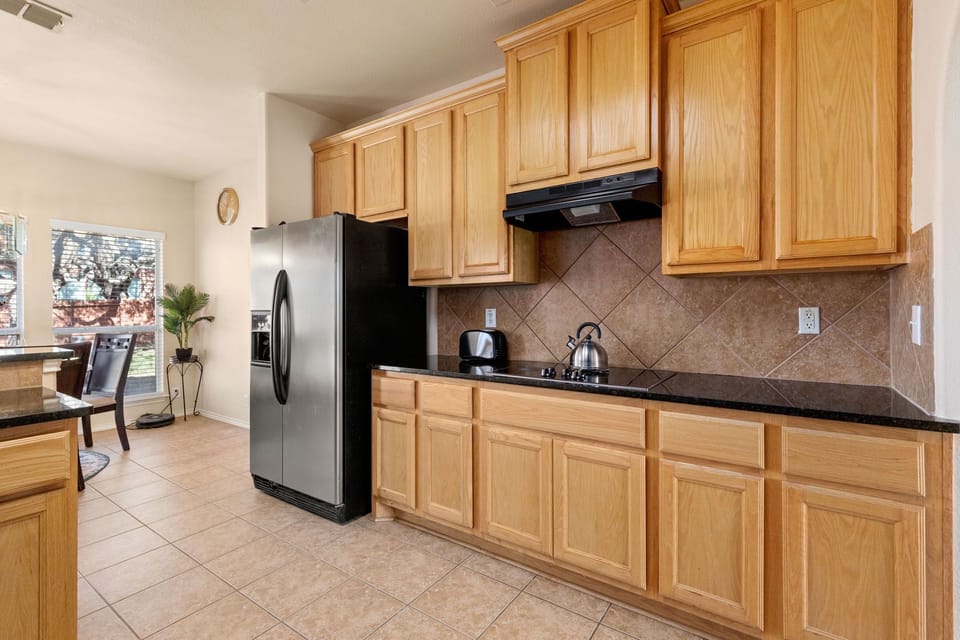 the large windows provide ample natural light and stunning views of the surrounding area.