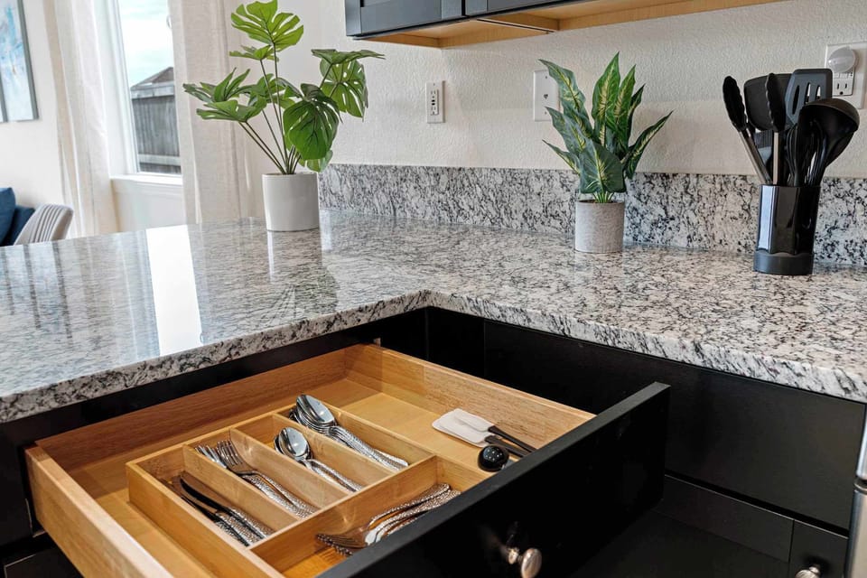 The kitchen is equipped with the necessary tools to prepare a tasty meal