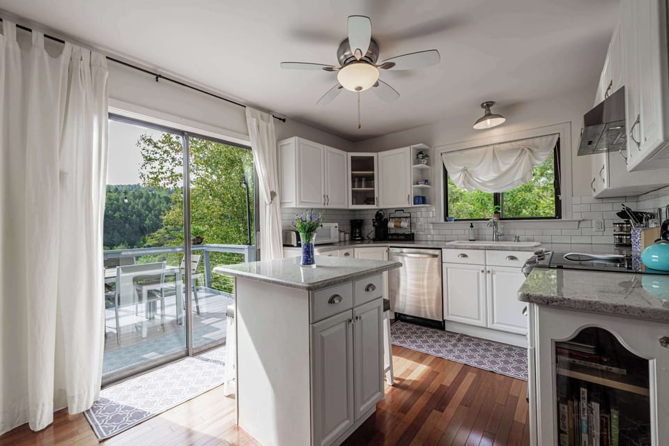Cook, create, and sip! This well-stocked kitchen has everything you need, plus a complimentary wine to toast your getaway!