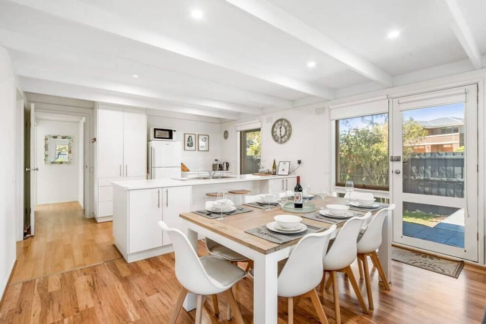 Open plan Dining flows through to Kitchen.
