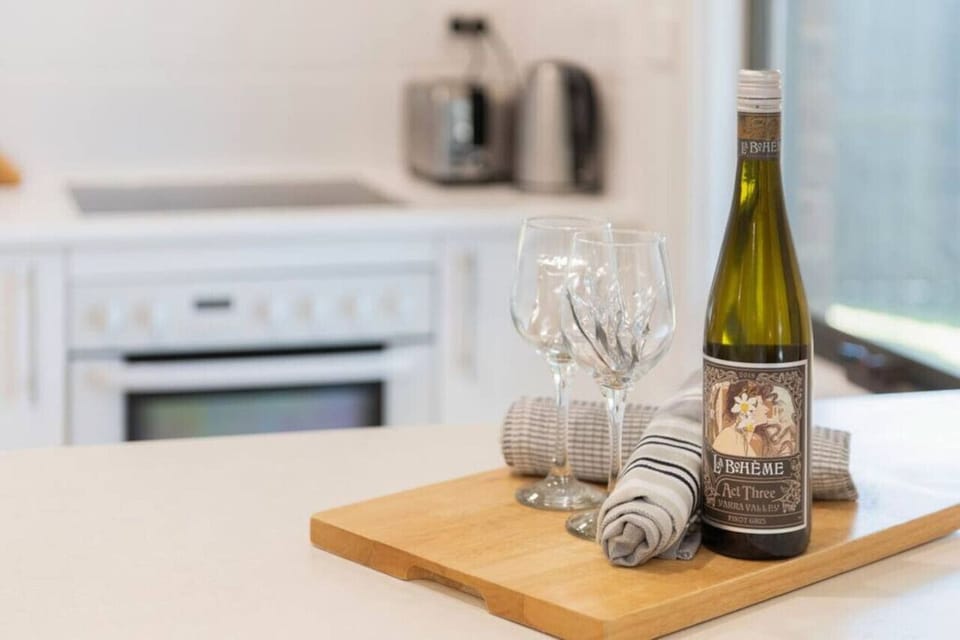 Enjoy a complimentary bottle of wine and snacks.