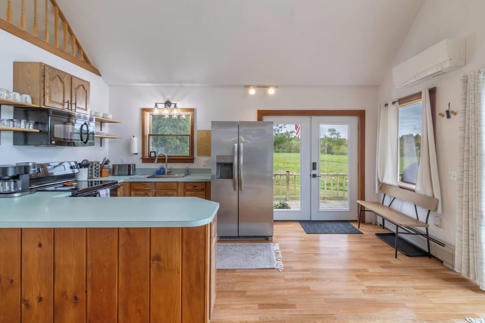 Cook a home cooked meal in the fully stocked kitchen