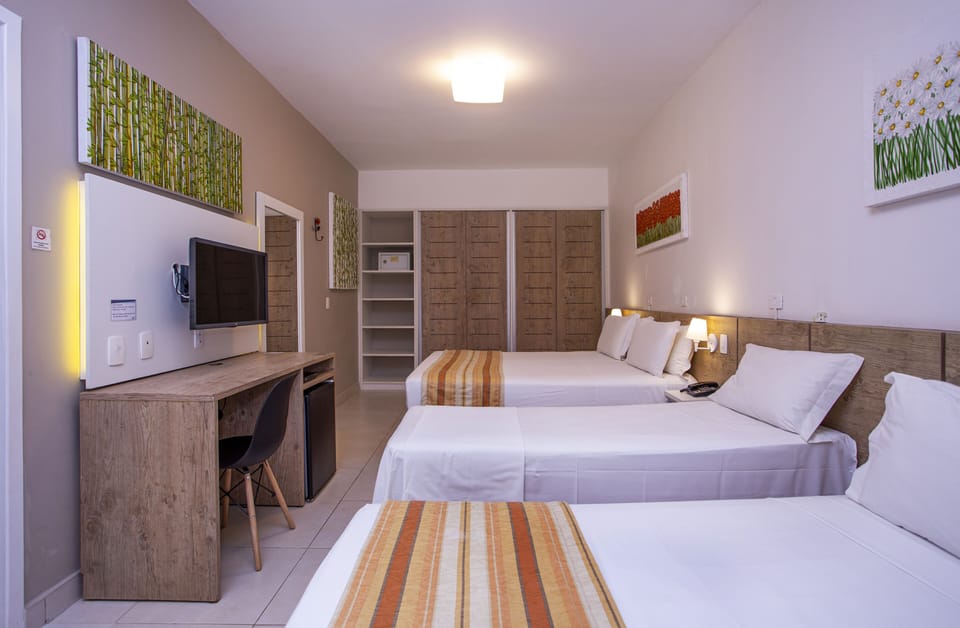 Comfort Apartment | Minibar, in-room safe, desk, blackout drapes