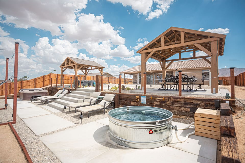 Take a refreshing dip in our cowboy-glam stock tank pool.