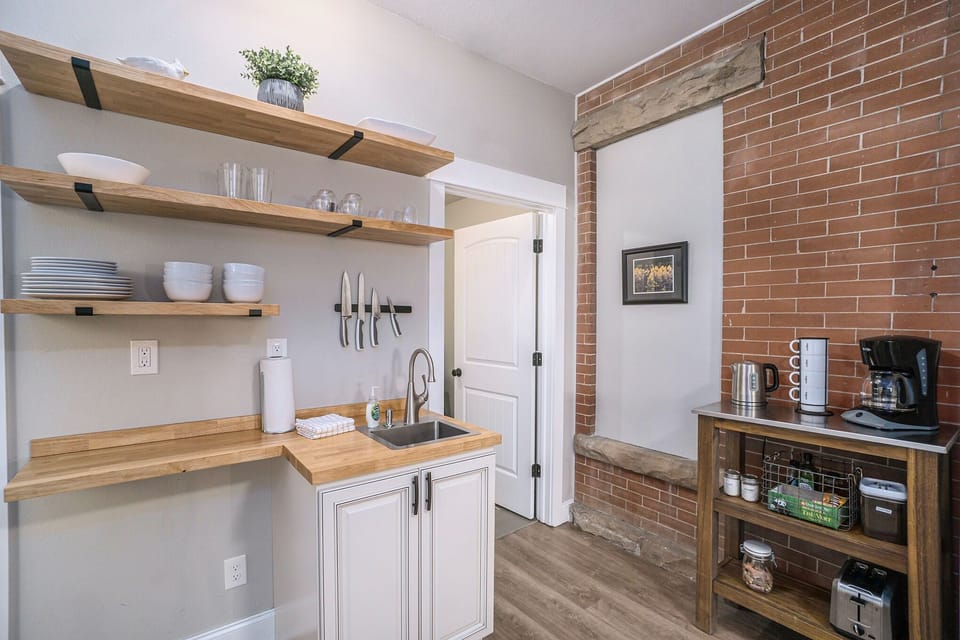 Apartment, 1 King Bed with Sofa bed, Patio, Garden View (633 Mathews St.) | Private kitchen | Fridge, microwave, coffee/tea maker, cookware/dishes/utensils