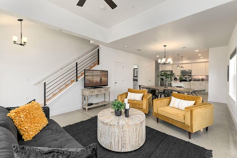 Townhome, Multiple Beds, Patio, Garden View (226 Osiander St. Unit D) | Living area | 50-inch flat-screen TV with cable channels, TV