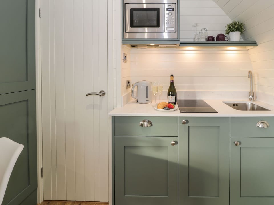Fridge, electric kettle, toaster, cookware/dishes/utensils