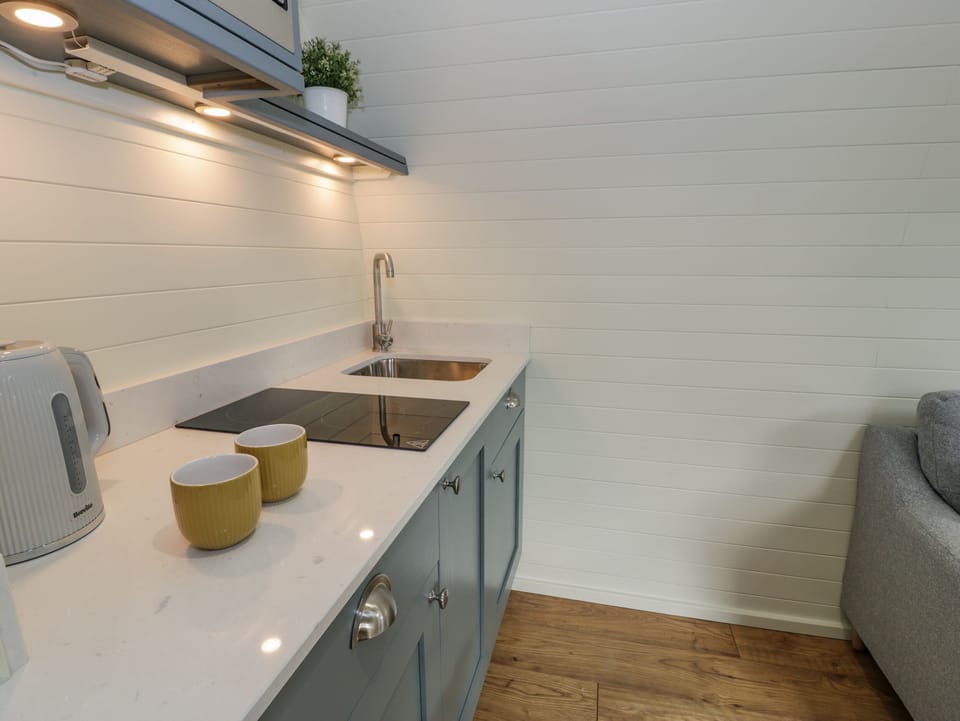 Fridge, electric kettle, toaster, cookware/dishes/utensils