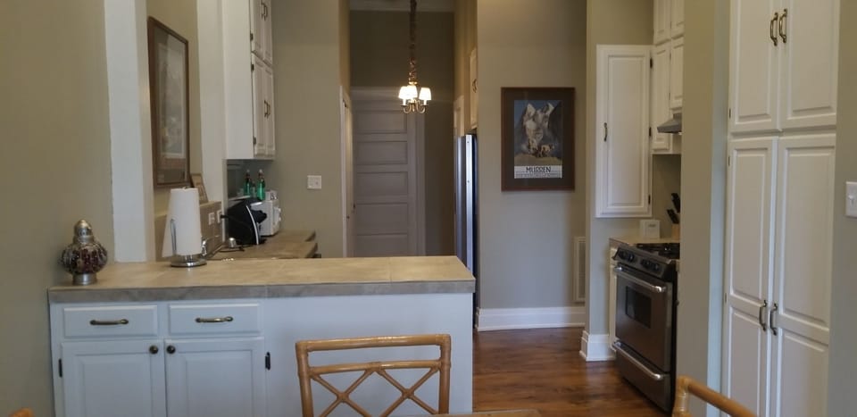 Deluxe 2 Bedroom Suite, Non-Smoking, Kitchen (Room 25) | Private kitchen | Fridge, coffee/tea maker