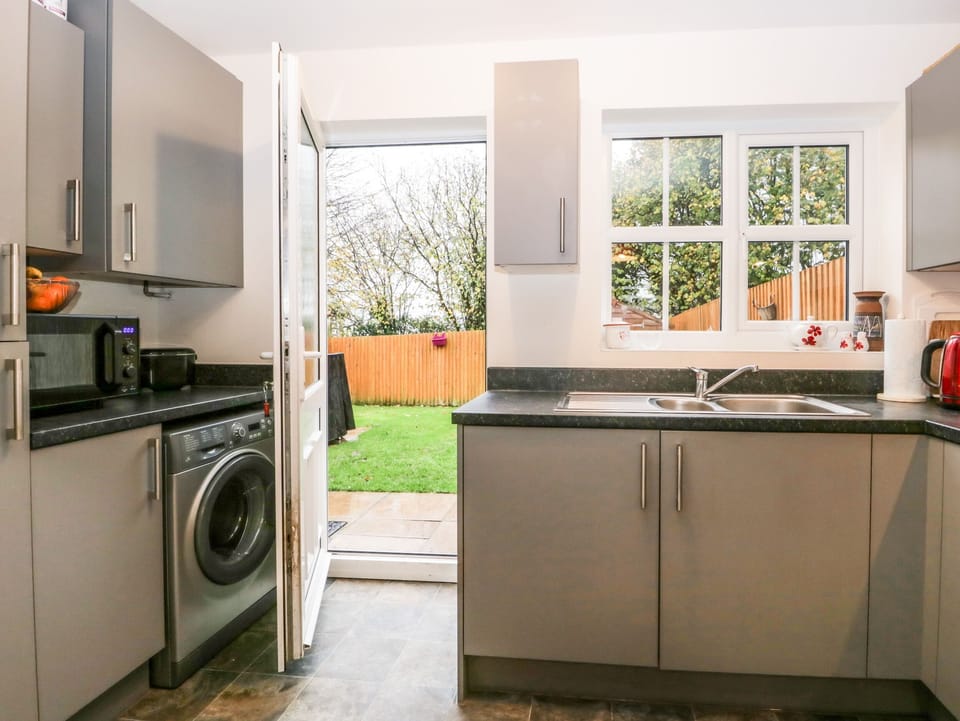 Fridge, electric kettle, toaster, cookware/dishes/utensils