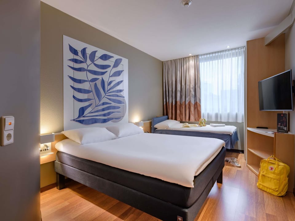 Hypo-allergenic bedding, desk, blackout drapes, soundproofing