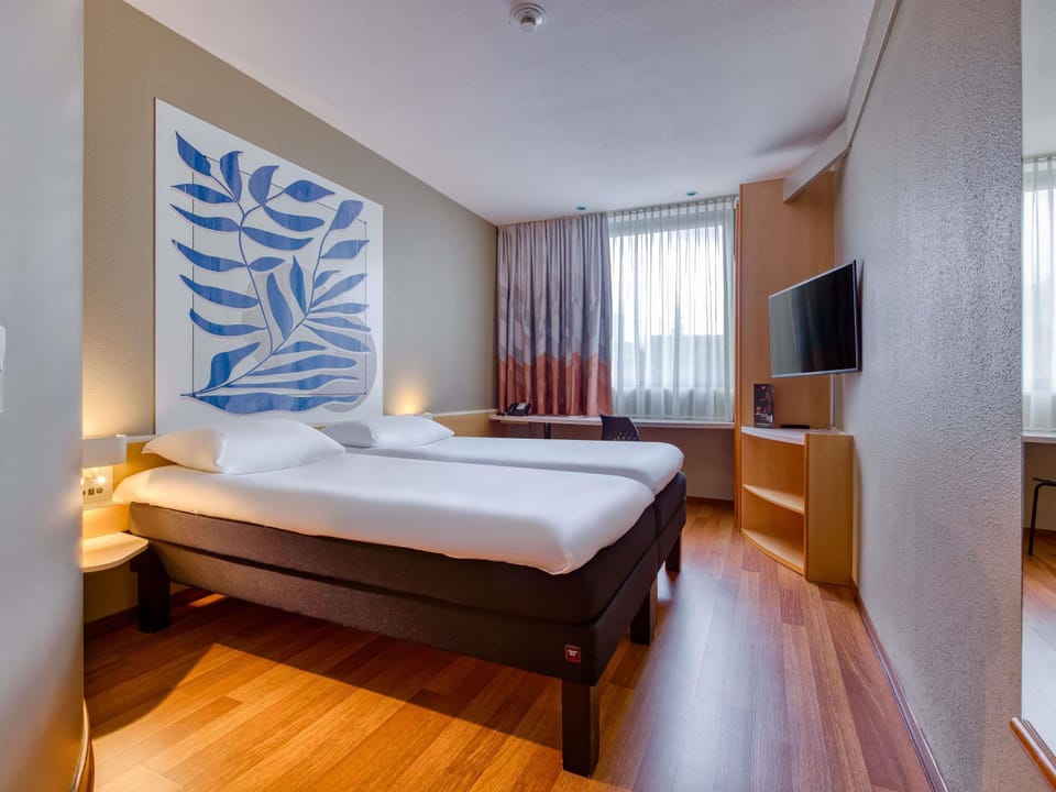 Hypo-allergenic bedding, desk, blackout drapes, soundproofing