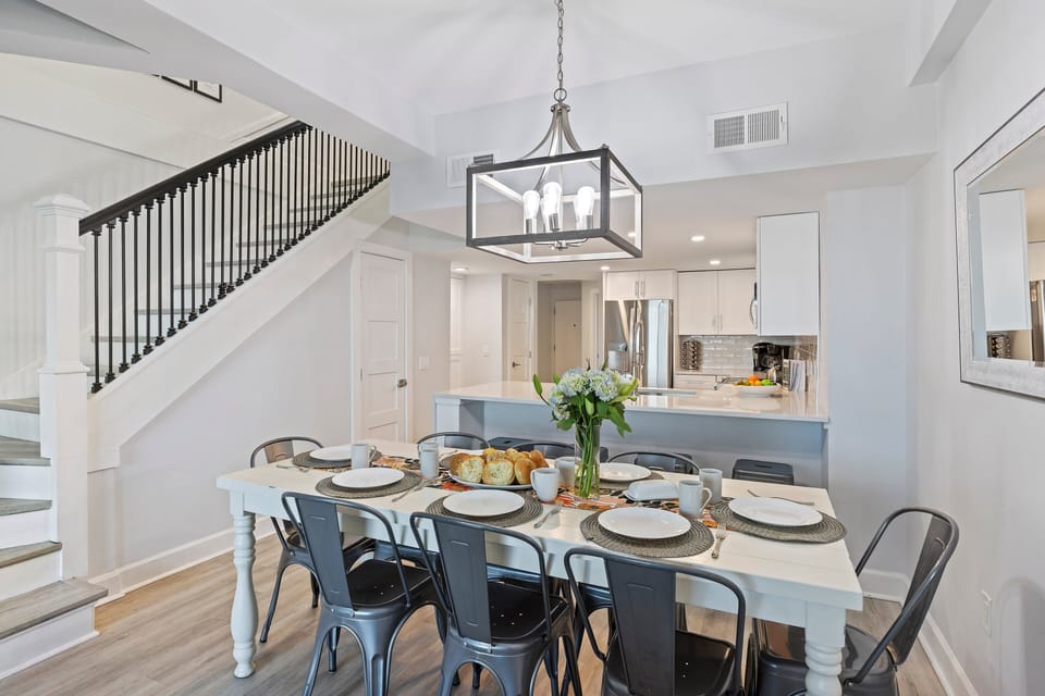 A large dining table offering seating for eight.