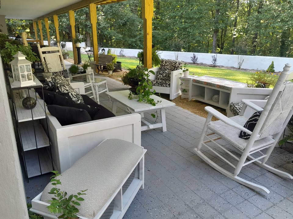 100' private patio includes multiple seating areas - perfect for large group