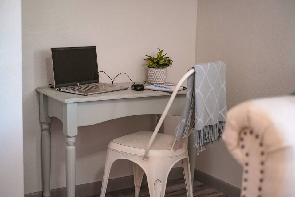 Perfect Staycation - The third bedroom offers a desk for a dedicated workspace if needed.