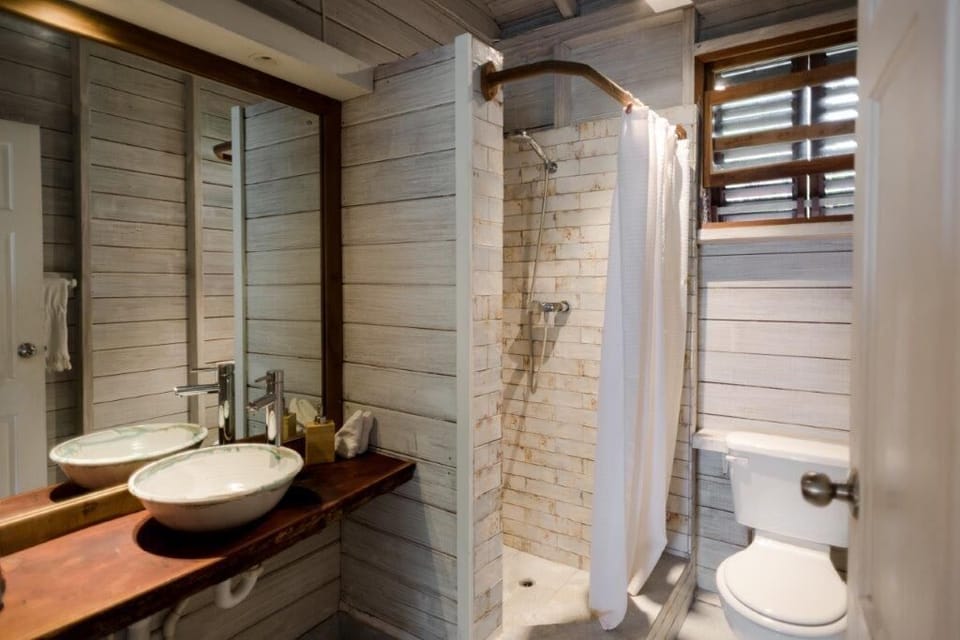 Junior Suite, 1 King Bed (Maycocks) | Bathroom | Shower, rainfall showerhead, free toiletries, hair dryer
