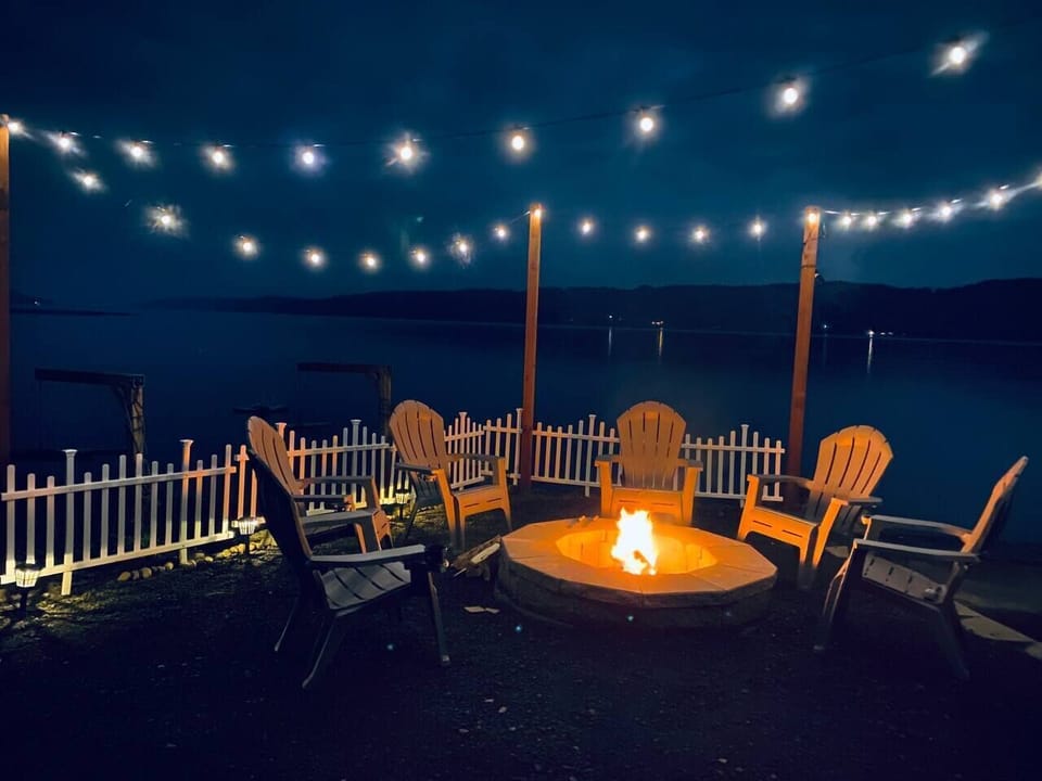 Unwind by the water’s edge—fire, friends, and Hood Canal views.