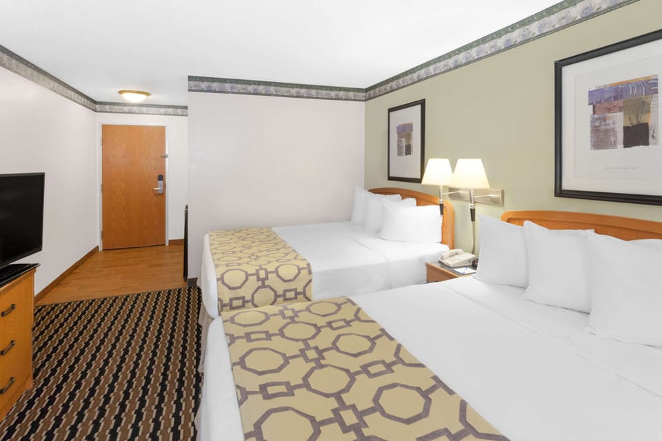 Standard Room, 2 Queen Beds, Non Smoking | In-room safe, desk, laptop workspace, blackout drapes