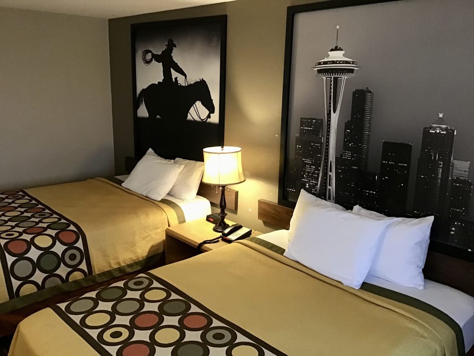 Desk, blackout drapes, iron/ironing board, free cribs/infant beds