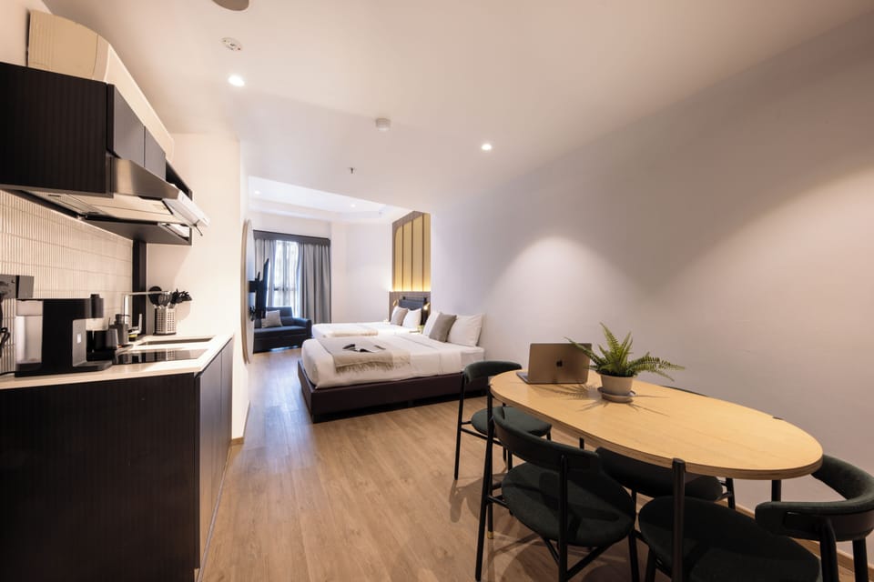 Family Suite, 2 Queen Beds | Minibar, desk, WiFi (free), individually furnished