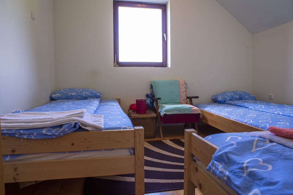 Bedroom with three single beds