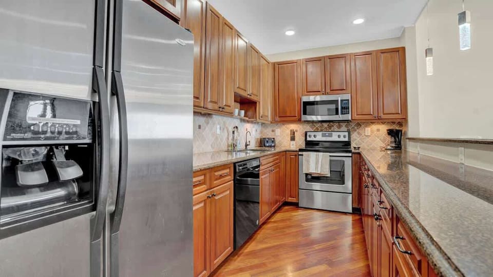 Fully equipped kitchen with modern appliances and everything needed for home-style meals.