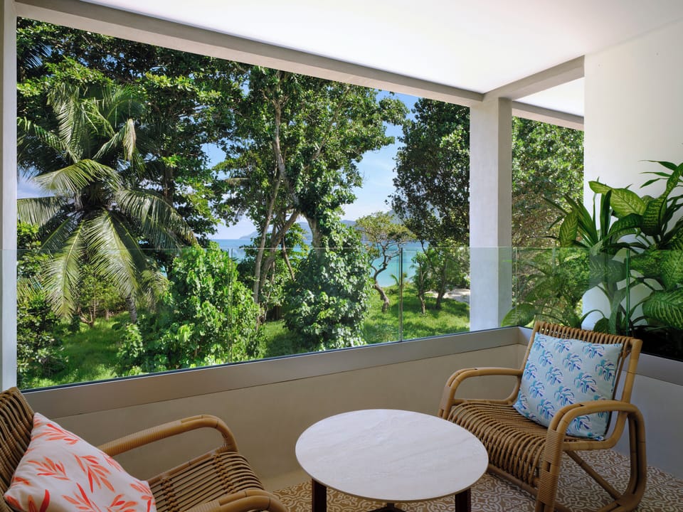 Deluxe Room, 1 King Bed, Balcony, Partial Sea View (Balcony) | Terrace/patio