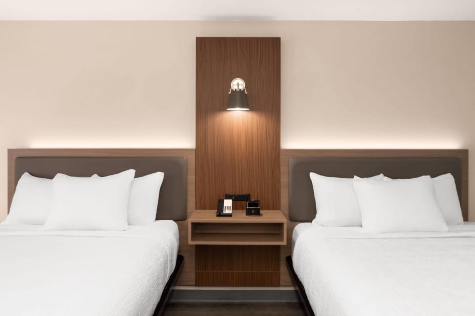 Room, 2 Queen Beds, Non Smoking | In-room safe, desk, iron/ironing board, free WiFi