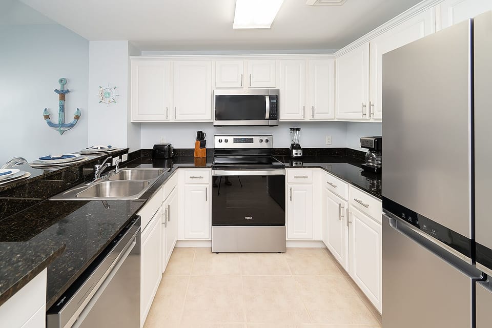 Kitchen with new stainless steel appliances