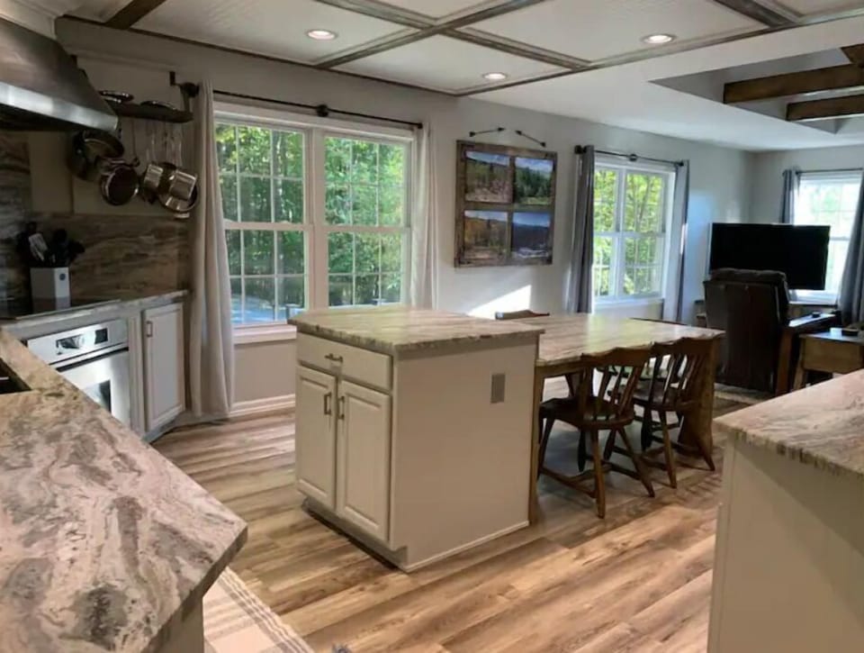 Eat-in island table with open concept dining