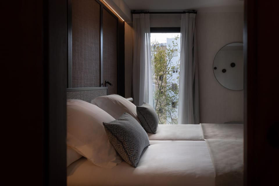 Premium bedding, down comforters, memory foam beds, minibar