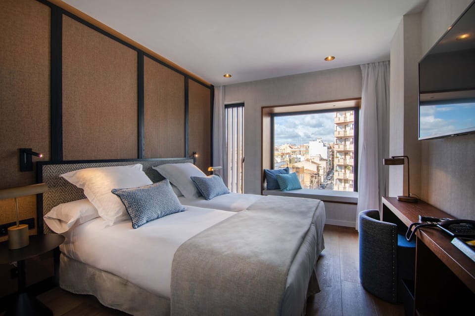 Premium bedding, down comforters, memory foam beds, minibar