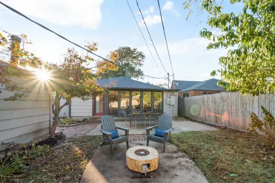 Private shaded backyard with lots of seating, gas grill and yard games! 
