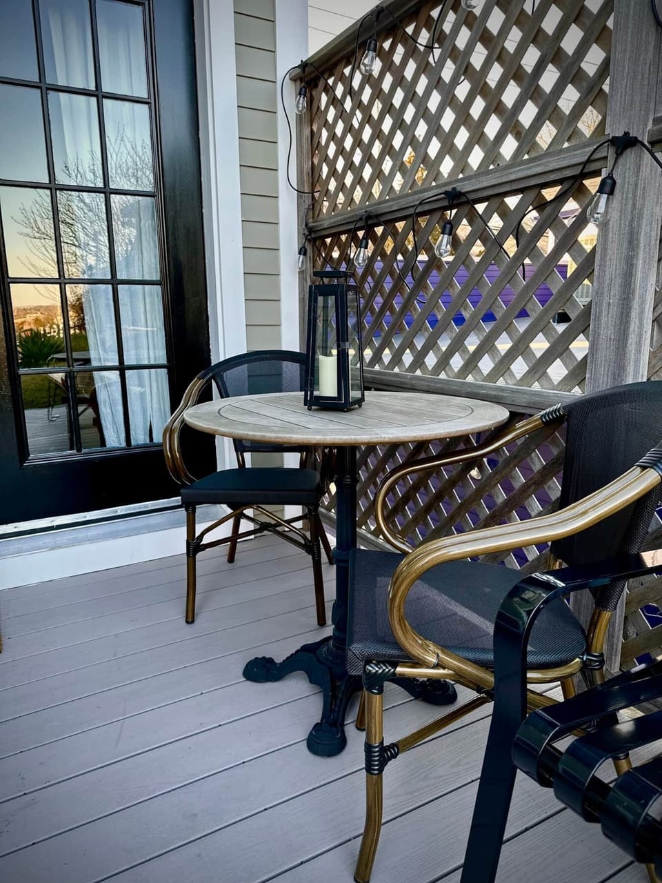 Cozy Deck Nook w/ Bistro Table and Patio Lights Overlooks the Yard to the River
