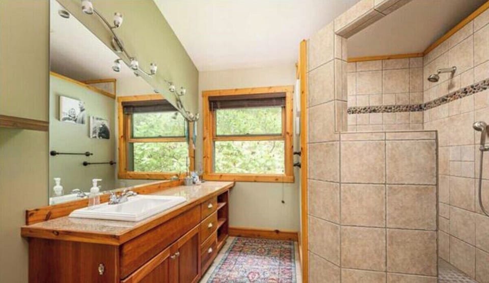 Master suite bathroom with walk-in shower 
