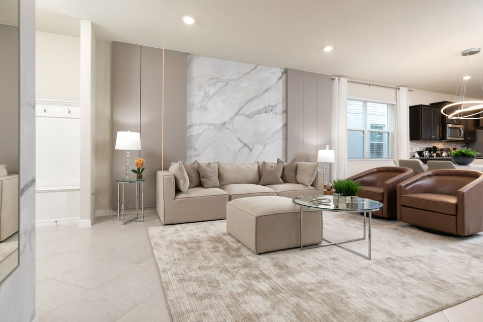 With light, neutral decor and comfortable sofas 