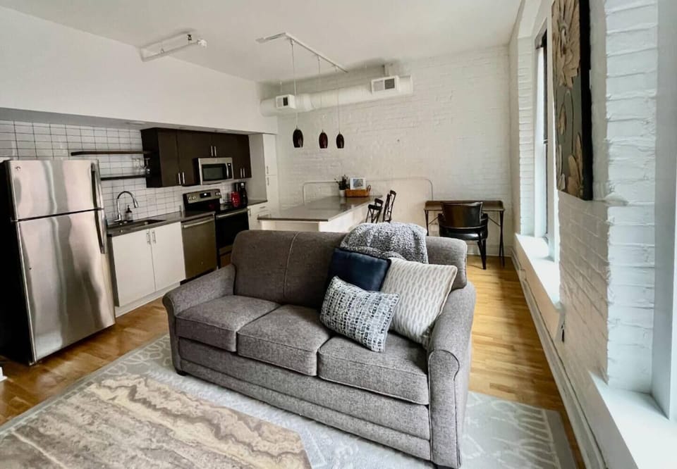 Full kitchen, with eat-in island and desk space in 303