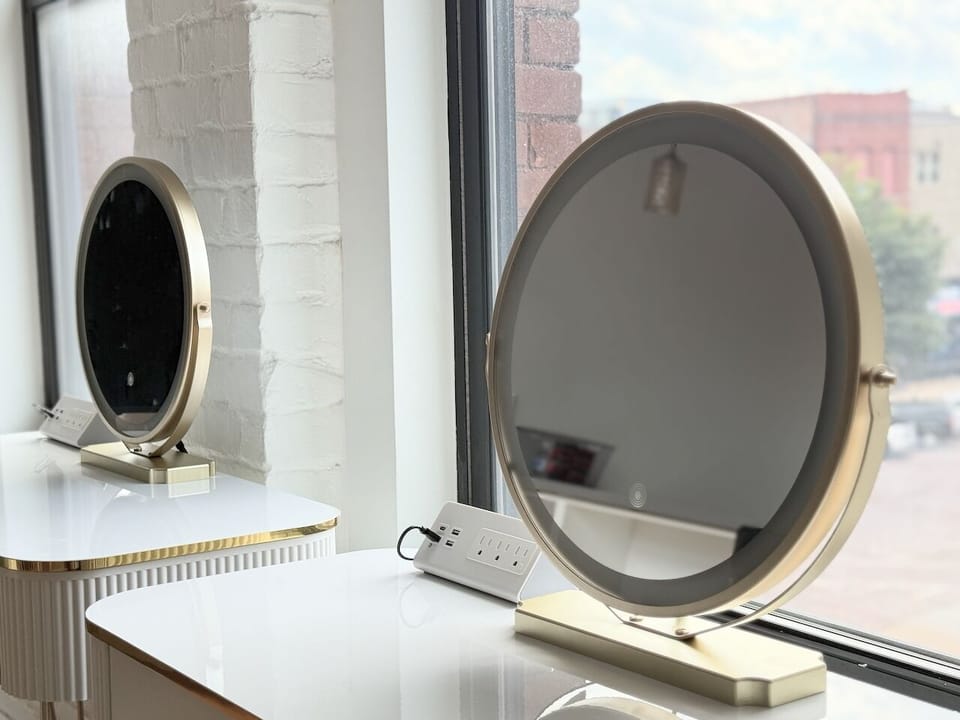 Lit mirrors and plenty of outlets