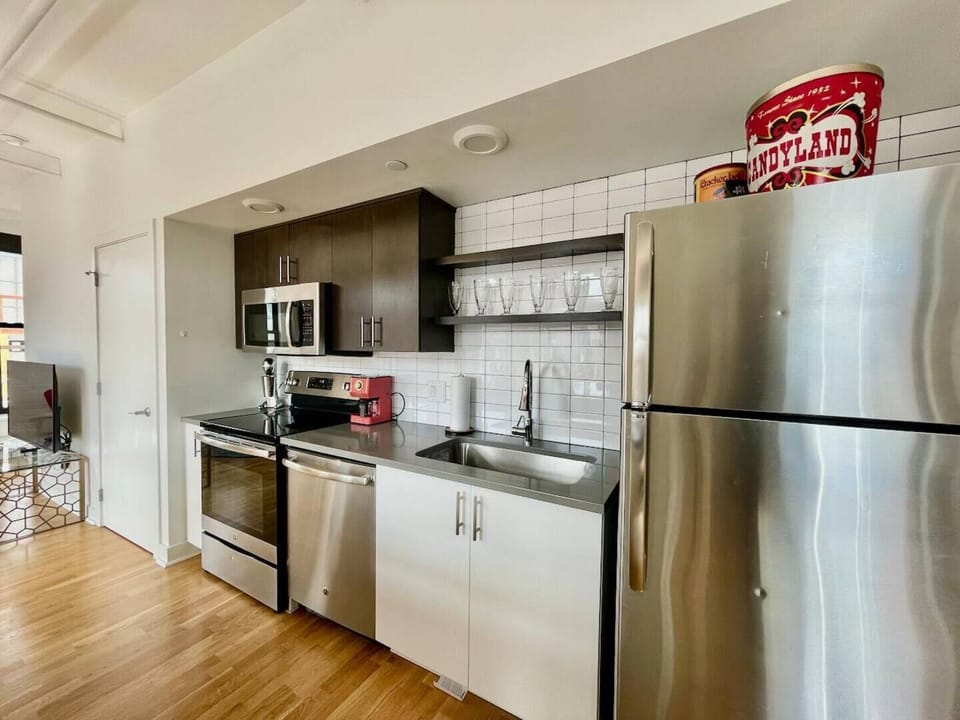 Full kitchen with stainless steel appliances and drip coffee maker