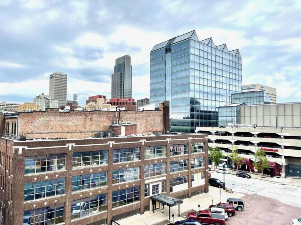 An amazing corner unit with a great view of the Old Market and downtown Omaha.