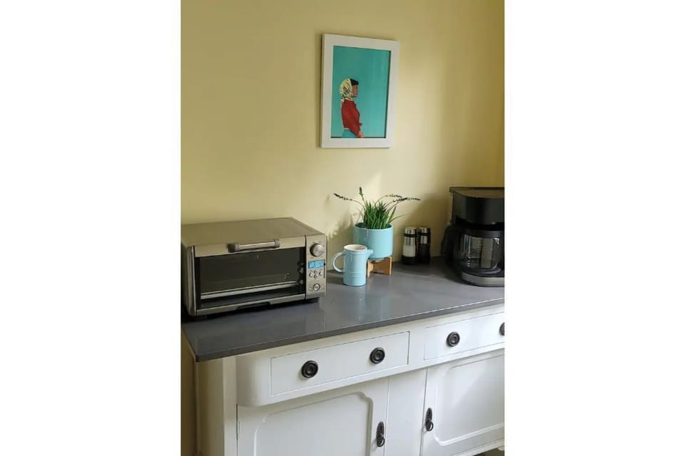 Quartz kitchenette with Keurig, toaster oven, and all the essentials. 