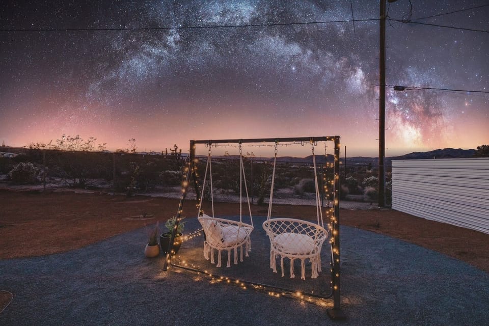 Swing into relaxation in our beautiful desert backyard, catching the sunset.