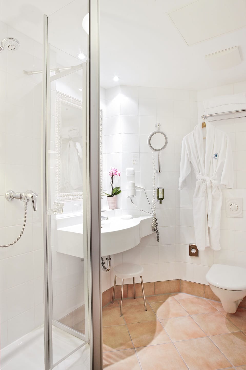 Eco-friendly toiletries, hair dryer, bathrobes, heated floors