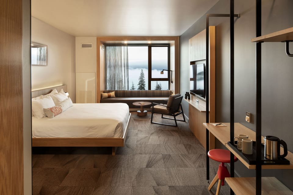 Room, 1 King Bed | Living area | 55-inch LCD TV with digital channels, streaming services, printers