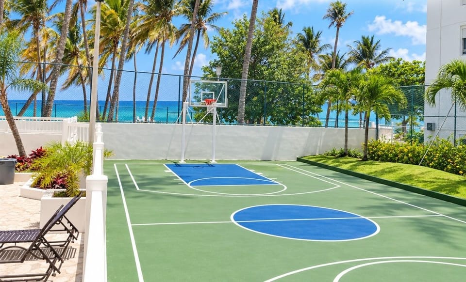 Outdoor basketball court with ocean views.