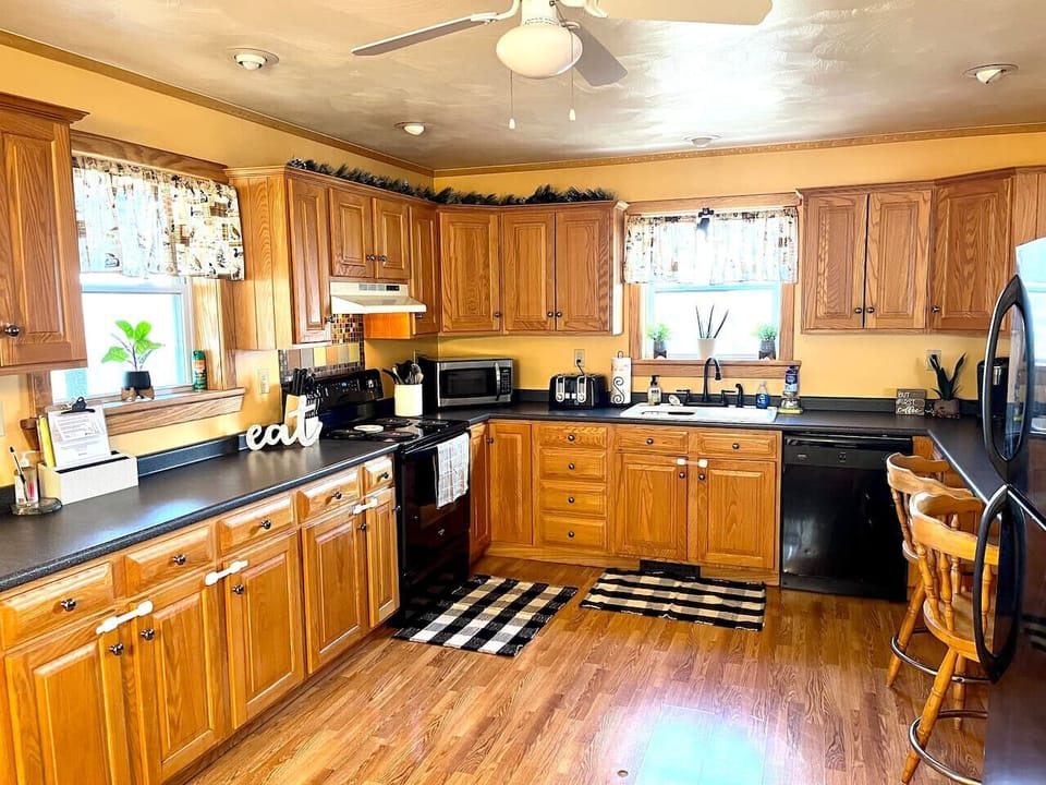 Spacious Kitchen with all cooking essentials provided for your stay.