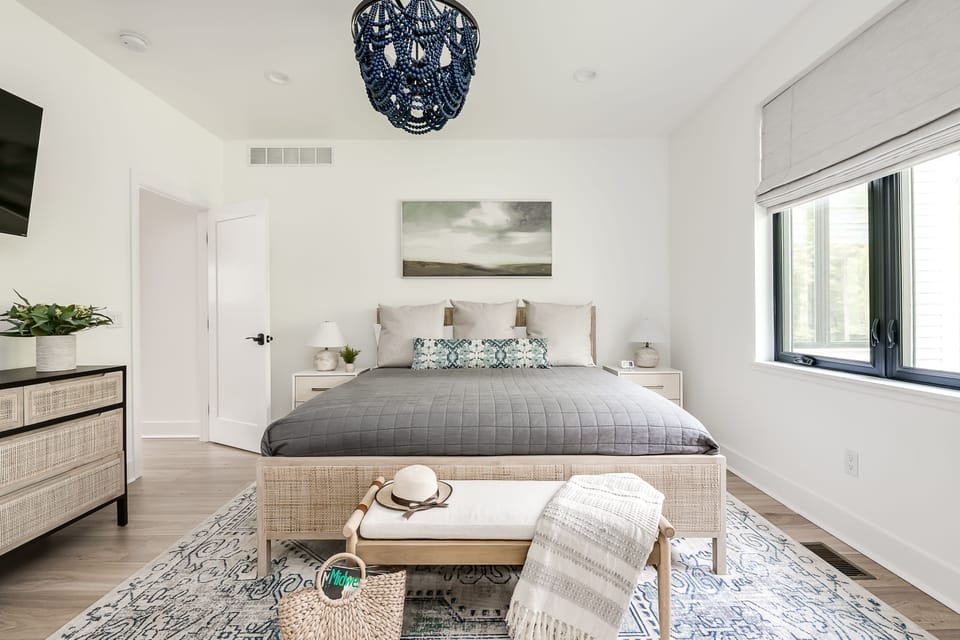 King Suite #1 — premium linens, an ensuite bath, and a room designed around your rest.