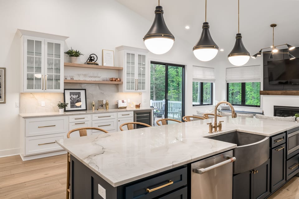 Cook together in a fully stocked gourmet kitchen — a large island, stainless appliances, and everything your group needs.	